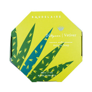 A BAUDELAIRE - VETIVER 7OZ BOXED BATH BAR, round and beige-colored, embossed with "Provence Santé, 200 g" in the center. This perfectly circular soap bar has a smooth surface and is enriched with shea butter, offering a unisex fragrance.