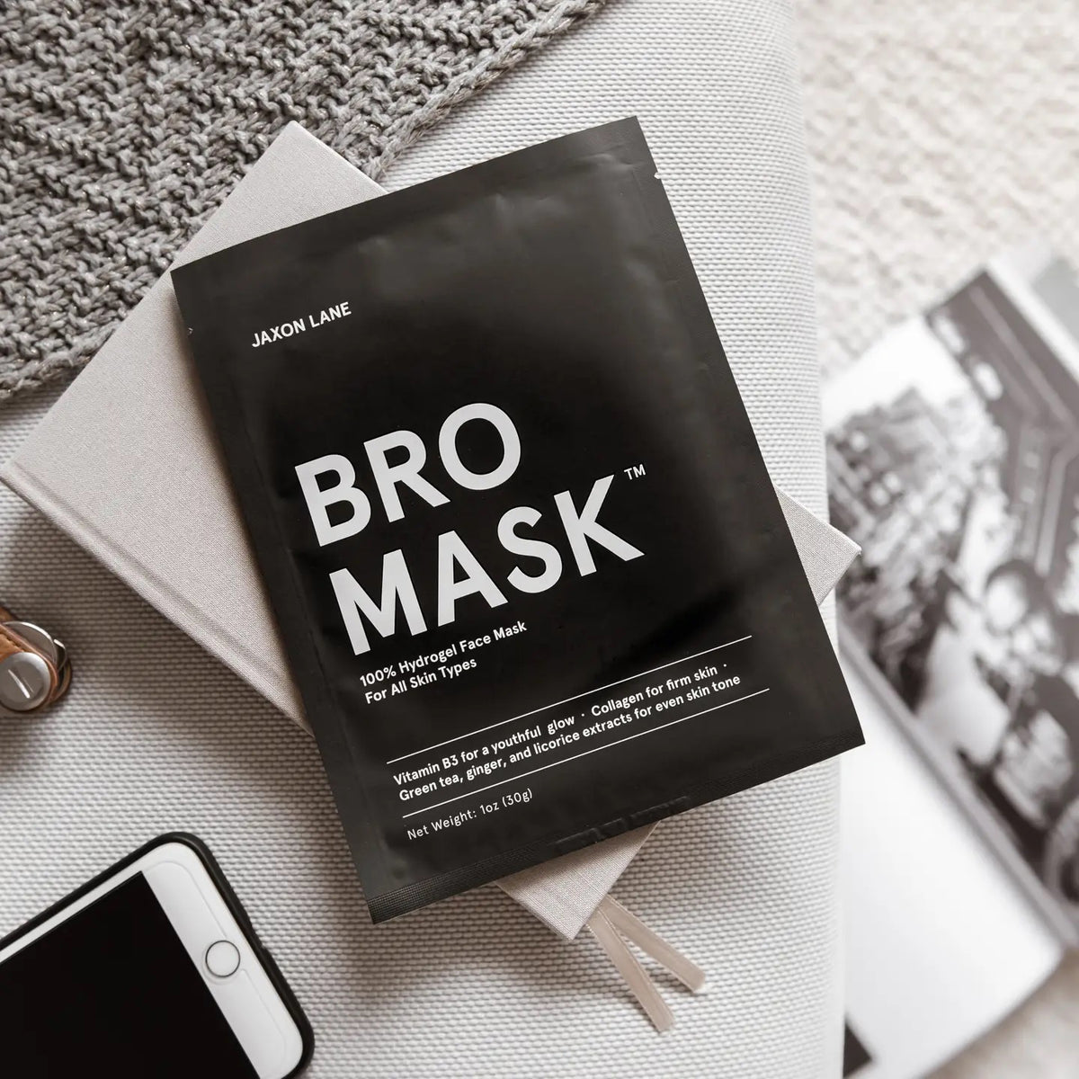 Two black packets of JAXON LANE - BRO MASK HYDROGEL FACE MASK are shown, featuring Men’s Health Grooming Awards 2019 and Brides Beauty Awards 2020 badges—a premium sheet mask for men by JAXON LANE.