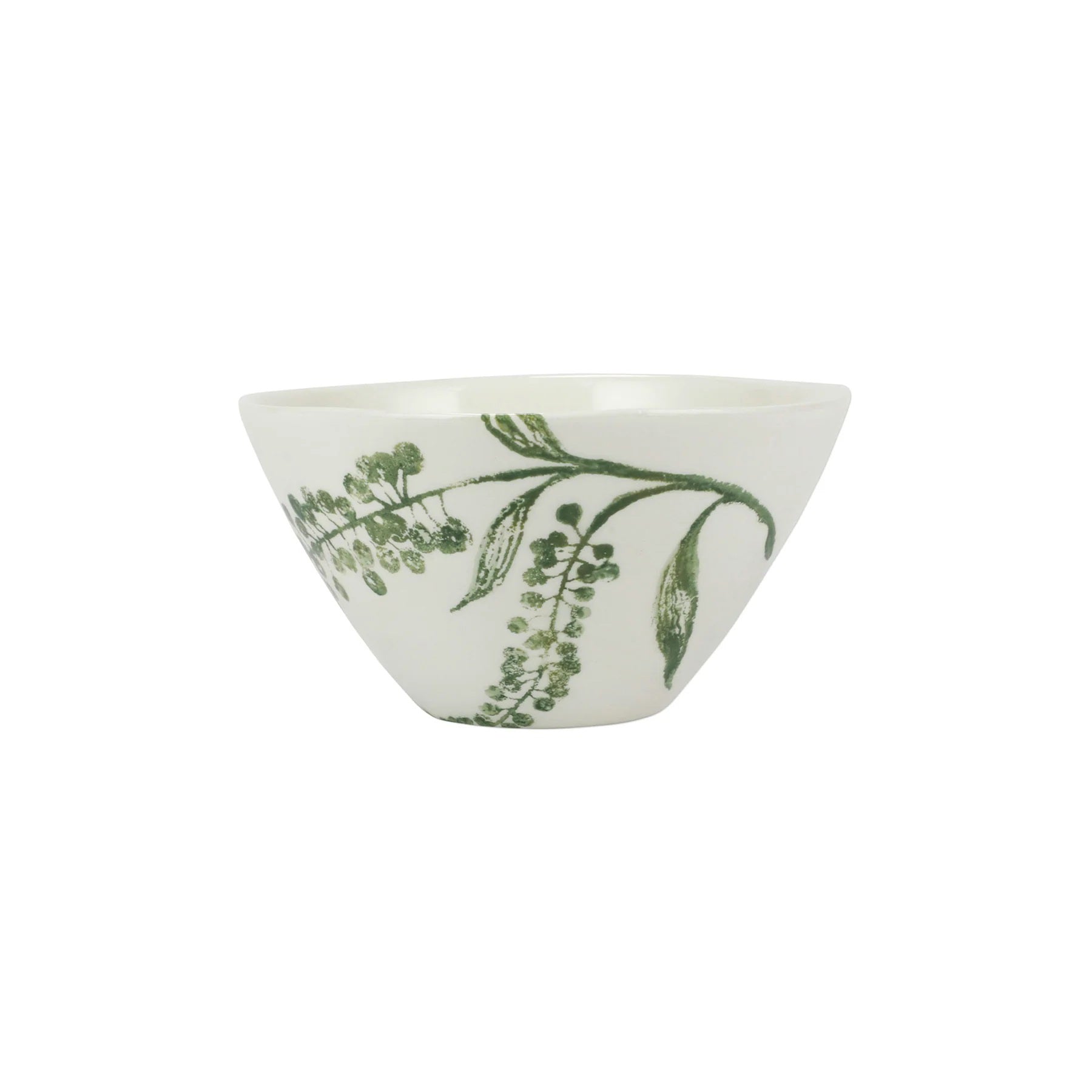 The VIETRI - Fauna Cereal Bowl is a small, white ceramic piece adorned with delicately painted green leaf designs on the exterior, evoking the lush greenery of Umbria. This bowl features a simple, elegant shape with a slightly flared rim and a smooth finish.