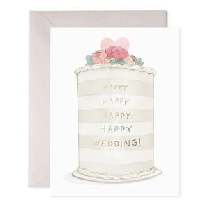 Illustration of a tall white wedding cake adorned with gold text repeating "Happy" and "Wedding!" This watercolor-style artwork, featured on the E.FRANCES PAPER FROSTED WEDDING GREETING CARD, is beautifully decorated with pastel roses and a pink heart. A folded gray envelope accompanies the card, making it ideal for special greetings.