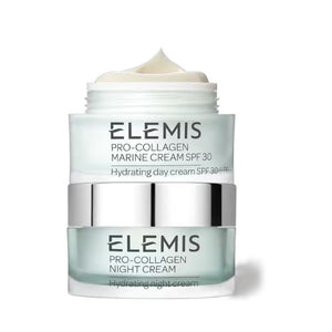 An image displays two skincare products from the Pro-Collagen line. The upper jar, "Elemis Pro-Collagen Marine Cream SPF 30," is elegantly placed above the lower jar, "Elemis Pro-Collagen Night Cream." Both jars are light blue with silver accents and are part of the "ELEMIS - THE PRO-COLLAGEN CLASSICS GIFT SET" by ELEMIS - STEINER, offering effective anti-aging benefits.