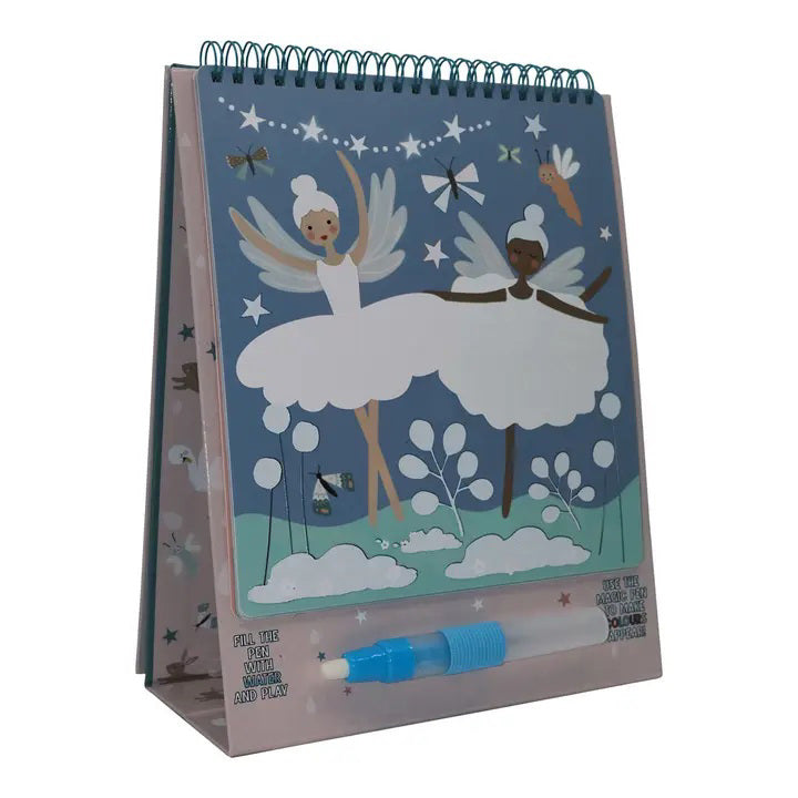 An image of the FLOSS & ROCK - MAGIC COLOR CHANGING ENCHANTED WATERCARD EASEL & PEN. The product is displayed in a standing position with a spiral binding at the top. It features colorful illustrations of fairies, animals, and other playful elements, along with a water pen attached at the base—perfect as a portable art set from Floss & Rock!