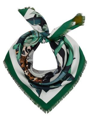 The FRANCO FERRARI - CIALDA DOUBLE SIDED FRINGE SILK SCARF 90CM, made of 100% silk, features a vibrant double-sided pattern in green, pink, orange, white, and brown hues. This colorful scarf can be folded into a triangle and tied at the top and is finished with fringed edges.