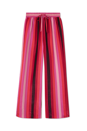 The NEVER FULLY DRESSED - ELISSA TROUSER by NEVER FULLY DRESSED features vertical pink stripes in shades of red and maroon. These breathable viscose wide-leg pants come with an elastic waistband and a drawstring for adjustment.