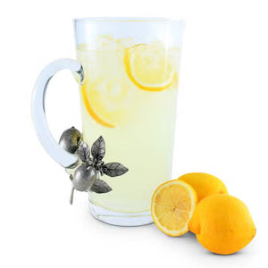 The VAGABOND HOUSE Pitcher features a clear glass design with a handle adorned in decorative pewter lemons and leaves, adding an elegant touch that seamlessly blends Italian glass artistry with simplicity.