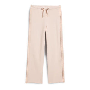 The FRANK & EILEEN Bella Italian Sweatpant by FRANK & EILEEN is a white, relaxed-fit pant featuring an elastic waistband and drawstring for adjustment. These pants have a subtle side stripe design and wide-leg fit, offering a comfortable yet stylish look.