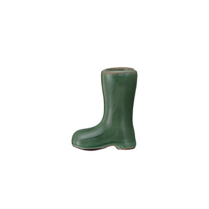 A small, green CREATIVE COOP GARDEN BOOT TOOTHPICK HOLDER shaped like a single garden boot, standing upright against a plain white background.