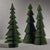 Introducing the WISH PAPER DECORATIVE TREE - ALPINA 24IN by ZODAX. This decorative cone-shaped paper tree boasts layered folds akin to a classic Christmas tree design. Crafted in a rich dark green hue, it measures 10 inches by 24 inches and elegantly stands upright against a simple white background.