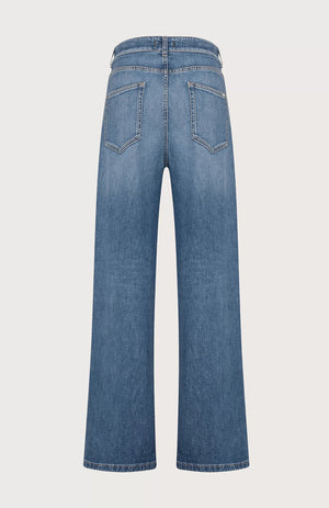 The SEVENTY VENEZIA High-Waisted Wide Leg Jeans from SEVENTY feature a high-waisted design and a wide-leg silhouette. These jeans include front and back pockets, a button and zipper fly closure, and a classic five-pocket design. The denim has a slightly worn, faded appearance.