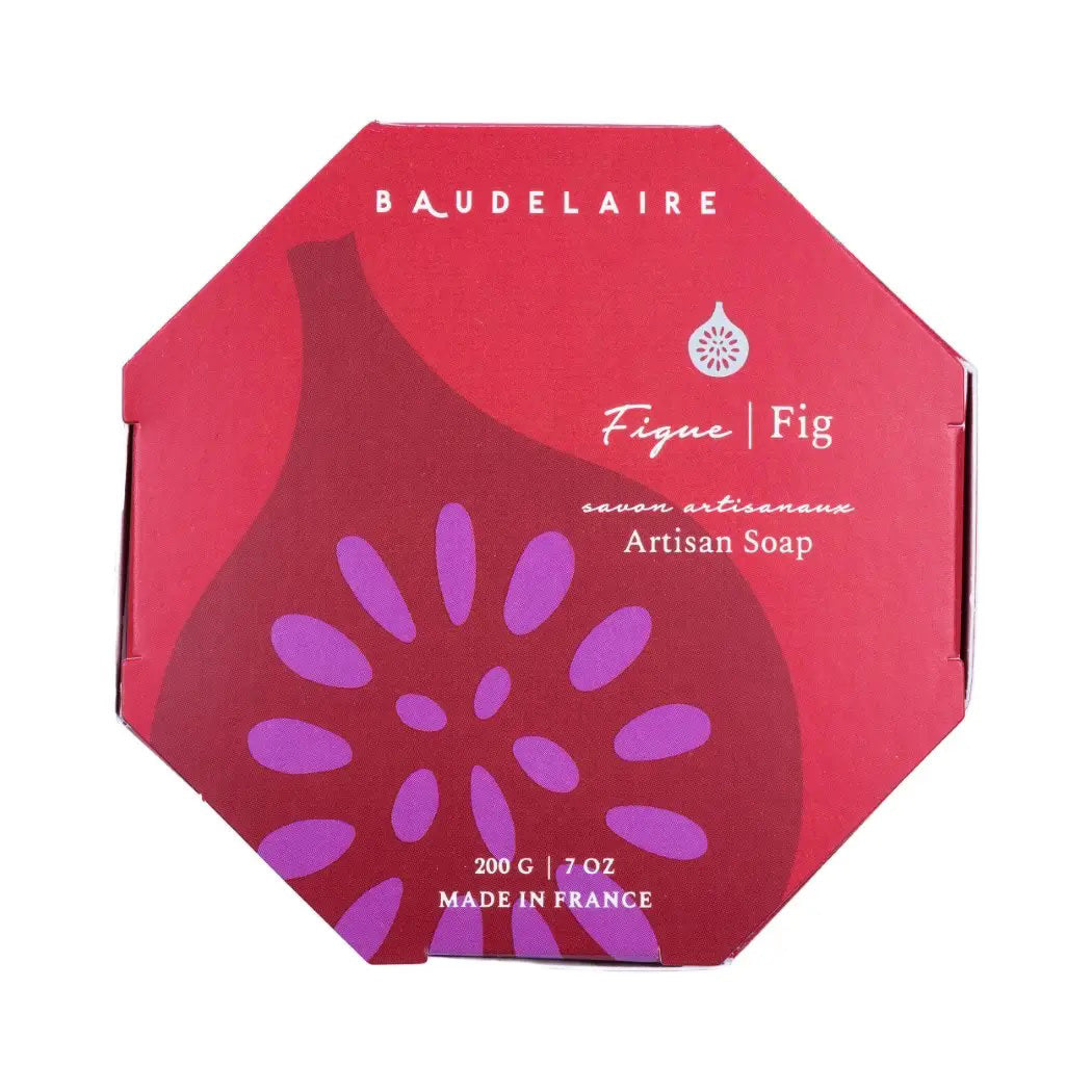 A round pink French-milled BAUDELAIRE soap, embossed with &quot;Provence Santé&quot; and &quot;200 g,&quot; enriched with a subtle fig fragrance, is set against a plain white background.