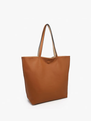 The TWO TONE REVERSIBLE TOTE by JEN & CO is displayed against a plain white background, featuring a red leather design with two handles. Its elegant two-tone appearance and subtly textured surface enhance the versatility and style it brings to any outfit.