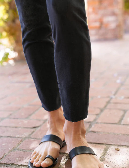 A pair of the FRANK &amp; EILEEN Sligo Skinny Jeans in the 1991 Wash is laid flat against a plain white background. These jeans feature a high-rise contour waistband, five pockets, and a slightly faded design on the thighs, offering a stylish and modern look with Italian Performance Denim for added comfort.