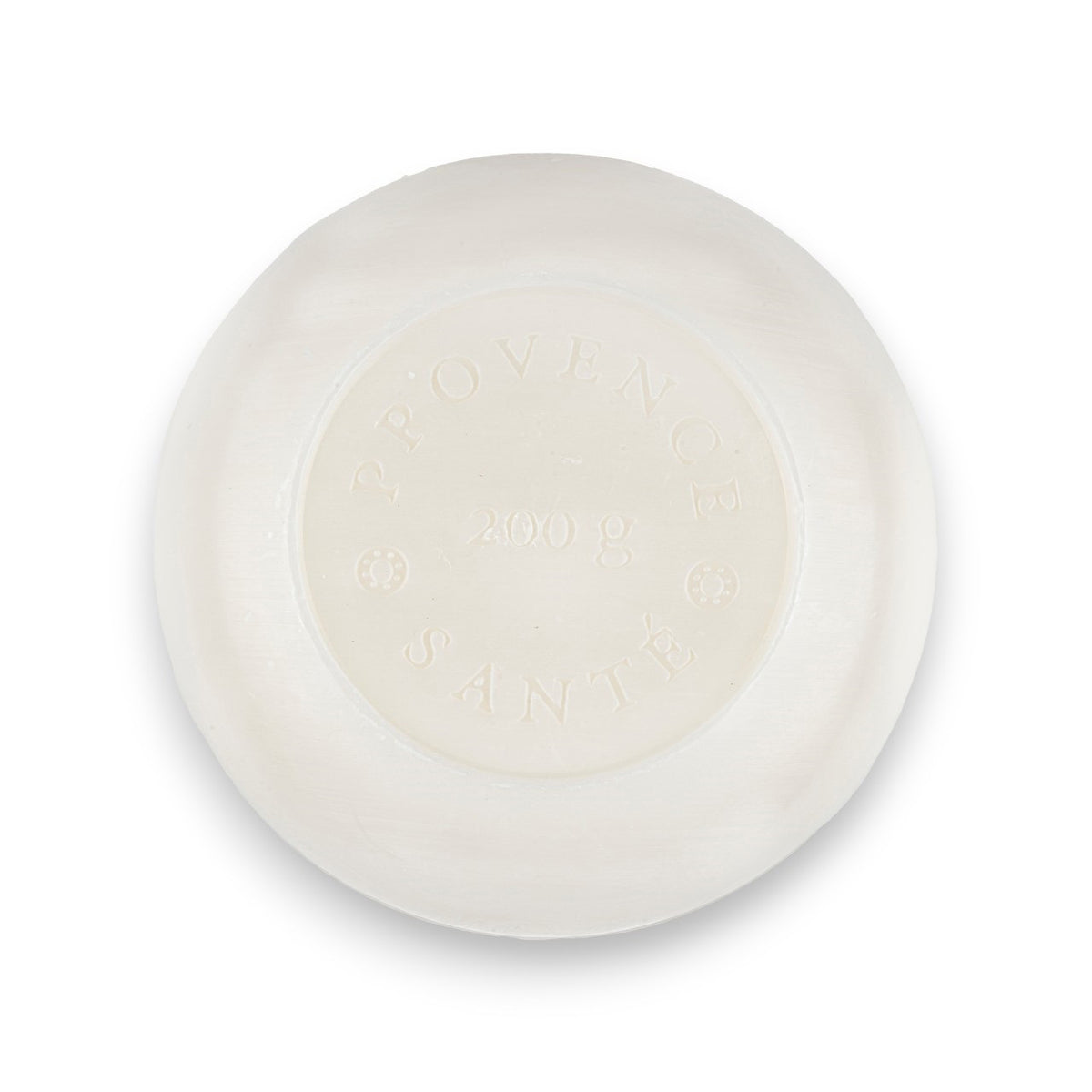 A circular bar of French-milled soap with a smooth, polished surface. The BAUDELAIRE - LINDEN 7OZ BOXED BATH BAR, enriched with shea butter, has an embossed label in the center that reads &quot;PROVENÇAL SANTÉ 200g.