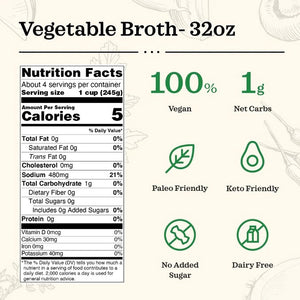 A carton of KETTLE & FIRE - ORGANIC VEGETABLE COOKING BROTH with a green label. The text highlights "Organic Ingredients" and "No Preservatives." The front features the product name and an illustration of vegetables. It states "New Look" at the top and specifies a net weight of 32 fl oz (907g), perfect for cooking flavorful meals.