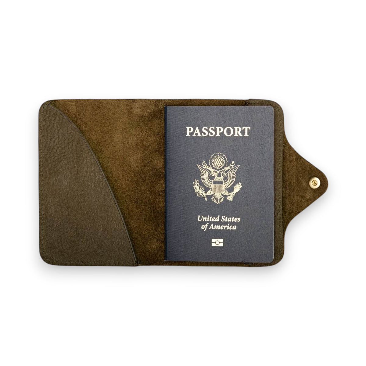 The WP STANDARD Leather Passport Holder in Olive features full-grain leather, visible stitching, and a button snap closure—ideal for keeping your travel essentials organized.