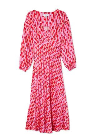 The NEVER FULLY DRESSED - EMMA DRESS by NEVER FULLY DRESSED is a versatile long-sleeve midi dress featuring a red and pink abstract geometric print. It includes a gathered detail at the elasticated waist, a slightly flared skirt, and a V-neckline, making it both stylish and breastfeeding friendly.