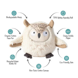 The PET SHOP BY FRINGE STUDIO's WHOOOO'S THERE OWL DOG TOY is a plush owl made from sustainable, recycled materials. This eco-friendly toy features biodegradable hemp, a TPR spiky squeaky ball, organic cotton faux fur, crazy crinkle paper, jute, non-toxic cotton canvas, and recycled water bottle fill.