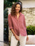 The FRANK & EILEEN Eileen Relaxed Button-Up Shirt in Mauve Washed Linen is a long-sleeved button-up shirt featuring a collar and a single chest pocket. The washed linen fabric provides a slightly textured appearance, with the sleeves casually rolled up for a laid-back style. This relaxed fit shirt is showcased against a plain white background.

