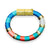 Introducing the HOLST + LEE - COLORBLOCK BRACELET by HOLST & LEE: a circular, multicolored accessory featuring sections of black, beige, and brown materials. This stunning bracelet is embellished with gold rings and a rectangular gold-plated magnetic clasp, seamlessly combining metallic elements with soft textured segments crafted from pearl cotton thread.