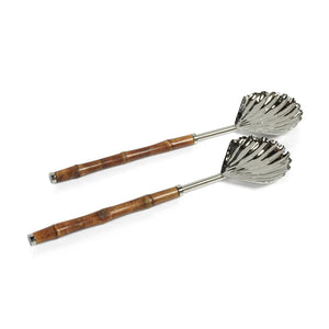 The BAMBOO AND NICKEL SERVER SET by ZODAX combines rustic and elegant elements with its silver shell-shaped fork and spoon complemented by natural-toned bamboo handles. Measuring 12 in x 3 in x .75 in, this polished set is ideal for adding sophistication to any table setting.