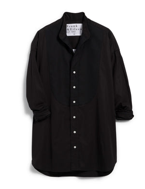 Displayed against a white backdrop is the FRANK AND EILEEN - VICTORIA ITALIAN TUXEDO SHIRT in black, featuring long sleeves and a woven jacquard bib. Inside, the label reads "Frank Kelleron Est. 1947." This luxurious Italian piece boasts a formal front panel, slightly rounded hem, and buttoned cuffs.