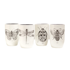 The STONEWARE TUMBLER W BEE by CREATIVE COOP is a white ceramic mug featuring an intricate black & white bee design with ornamental patterns, offering a smooth finish and simple elegance.