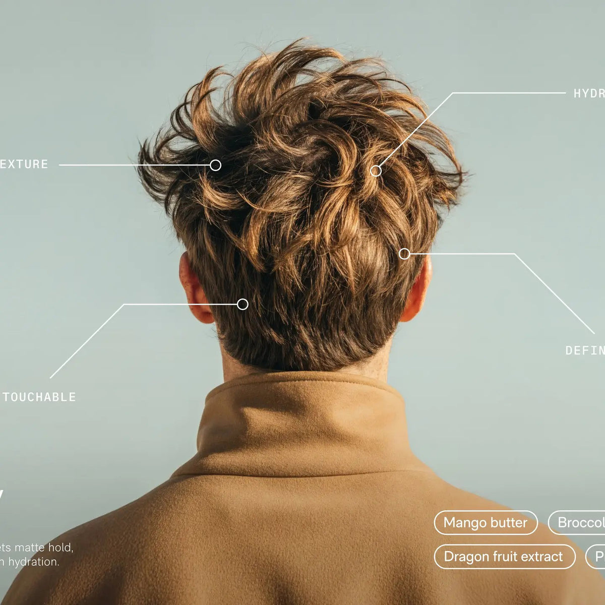 A round black container labeled &quot;JACK HENRY - HAIR PUTTY&quot; features white text promoting hydrating, volumizing benefits with medium hold and a matte finish. The Jack Henry container casts a shadow on a white background.