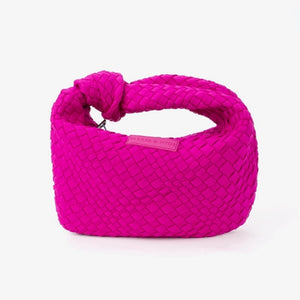 The PARKER & HYDE Woven Knot Bag is a vibrant pink neoprene blend handbag, handwoven with a textured pattern and featuring a knot detail at the top and a visible brand label in the center.