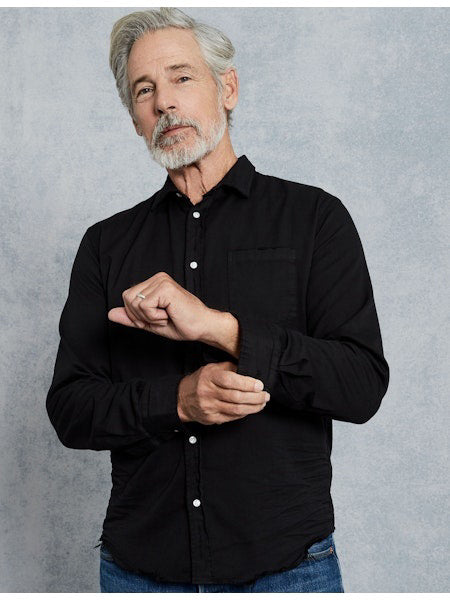 The FRANK &amp; EILEEN Luke Men&#39;s Button Up Shirt in Famous Denim Blackout features long sleeves, a chest pocket, and rolled cuffs, shown laid flat on a white background.