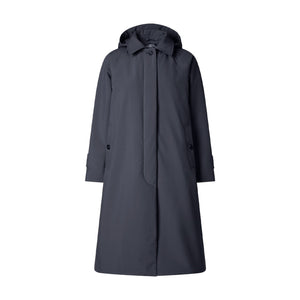 The SAVE THE DUCK - ZOEY RAINCOAT, offered by SAVE THE DUCK in a long, dark navy blue design, is showcased against a white background. This stylish and practical raincoat features a front button closure, side pockets, and adjustable sleeve cuffs. Additionally, it includes insulating padding and a detachable hood to ensure complete coverage during rainy weather.