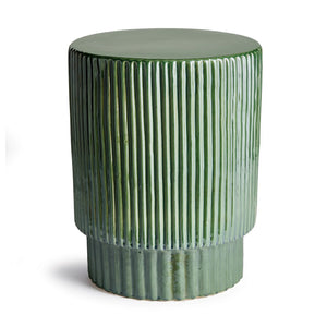 The NAPA HOME AND GARDEN Remi Stool is a green ceramic piece with a ribbed texture and glossy finish, ideal as extra seating or an end table. Its cylindrical shape features a slightly wider top and narrower bottom.