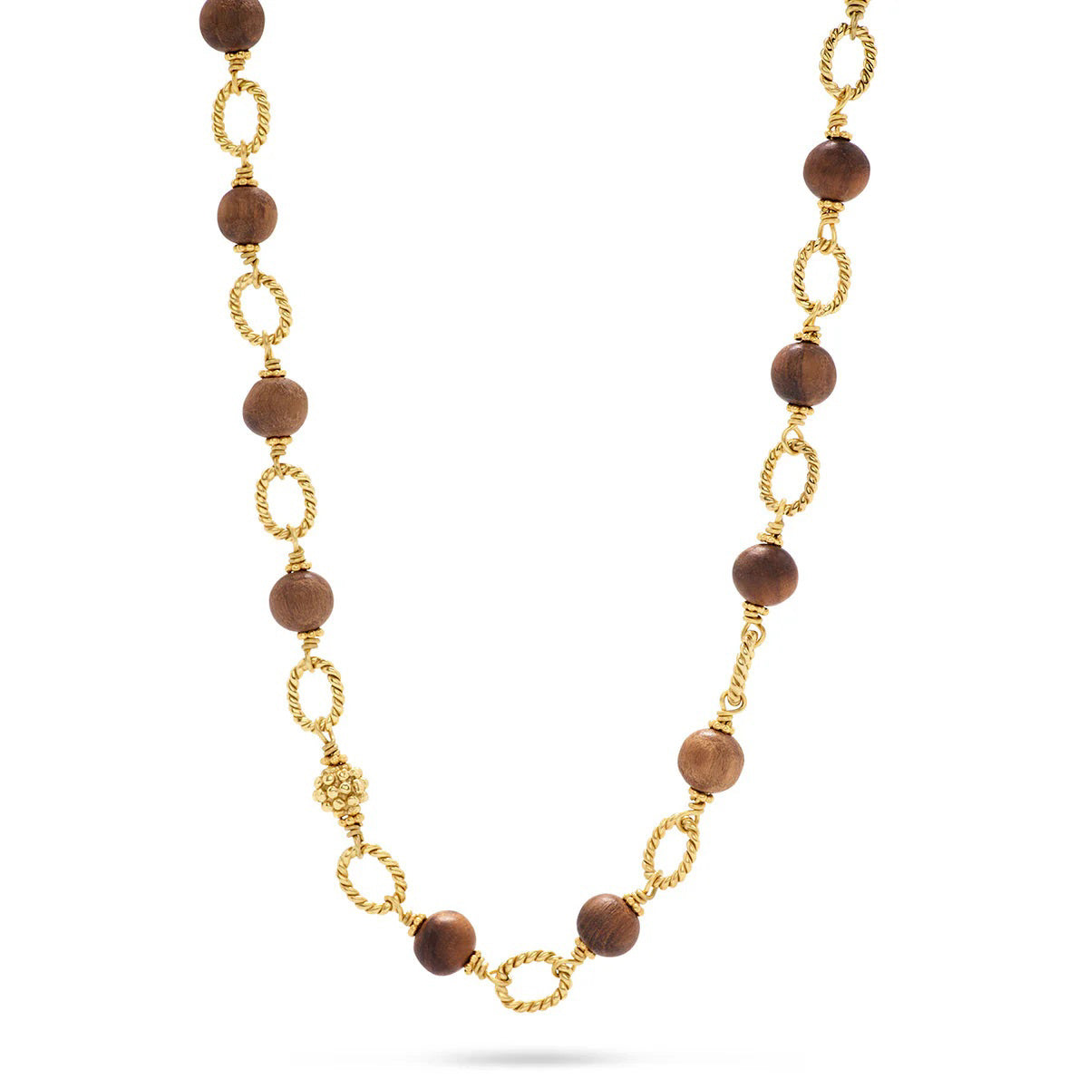 The CAPUCINE DE WULF - EARTH GODDESS LINK NECKLACE WITH TEAK by CAPUCINE DE WULF features alternating brown teak beads and intricate gold chain links. This versatile piece of jewelry is finished with a decorative gold clasp, giving it a sophisticated and elegant look.