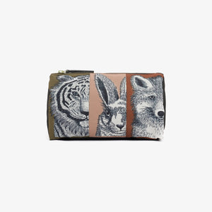 The INOUI EDITIONS - FRERES COSMETIC BAG by INOUI is a rectangular pouch featuring three illustrated animal faces divided into vertical panels. From left to right, it showcases a tiger on a green background, a rabbit on a pink background, and a fox on a beige background. Made from recycled polyester, the pouch includes a top zipper.