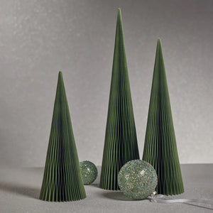 The WISH PAPER DECORATE CONE TREE by ZODAX, a minimalist cone-shaped sculpture in green that resembles a Christmas tree, stands upright against a plain white background, its 24-inch height adding to its allure.