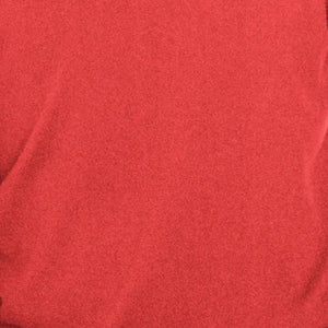 Close-up of a red KINROSS Men's Coverstitch Cashmere Sweatshirt, highlighting its soft, smooth texture and gentle folds. The lighting brings out the rich color and 2ply texture variations.