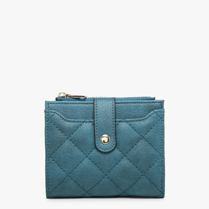 The QUILTED ZIP TOP WALLET by JEN & CO is a teal, small, quilted vegan leather wallet featuring a gold snap closure and a zippered compartment at the top, all set against a plain white background.