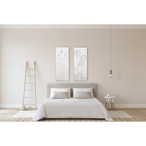 The Embossed Metal Dandelion Art by Creative Coop showcases two vertical panels with embossed botanical designs, featuring off-white flowers and ferns. Its intricate stems and leaves bring texture and elegance to any neutral background.