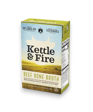 KETTLE & FIRE - REGENERATIVE BEEF BONE BROTH carton, prominently displaying phrases such as "100% Grass-Fed," "Sustainable," "Made with 100% Grass-Fed Beef Bones," and "Regenerative Agriculture." The nutrition facts and ingredients lists are visible on the side. Net weight: 16.9 oz (1.06 pints). Ideal for those seeking quality bone broth from regenerative farms.