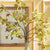 Introducing the VARIEGATED LEAF BRANCH 43" from NAPA HOME AND GARDEN: This elegant piece features a single long stem with several branches adorned with clusters of small, realistic leaves. The leaves exhibit a light to medium green hue with hints of yellow and have a slightly translucent texture. A slender, dark green stem adds a natural touch to any festive garland.