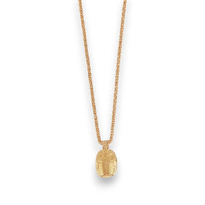 The GAS BIJOUX Scarabee Short Gold Necklace features a gold-plated design with a hand-engraved scarab beetle pendant, offering an elegant and adjustable fit.