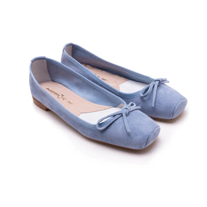 The MICHELE LOPRIORE - PALOMA ballet flat with a square toe, crafted from genuine silver leather, features a delicate bow on the front and a low-profile brown sole. Made in Italy, this elegant shoe is set against a plain white textured background.