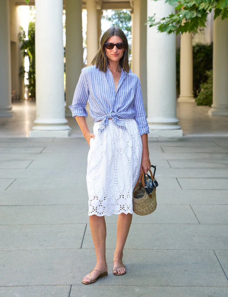The FRANK &amp; EILEEN Grace Eyelet Skirt features a white, lightweight fabric, an elastic waistband, scalloped edges, and embroidered floral details for an airy, flattering silhouette.