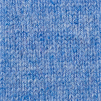 Close-up of a white, textured knit fabric. The image showcases the intricate and uniform stitches of the 2ply, 9gg knit used in the KINROSS CASHMERE - TEXTURED SLOUCHY FUNNEL NECK SWEATER by KINROSS, hinting at a soft cashmere material. The plain and undisturbed background emphasizes the textile's pristine appearance.