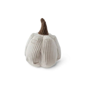 A small, plush pumpkin made of beige corduroy fabric with a brown stem rests on a white surface. The neutral background enhances the simple, handcrafted design of this LAMBWOLF COLLECTIVE - BOO DOG TOY from LAMBWOLF COLLECTIVE, which features treat pockets for added fun.