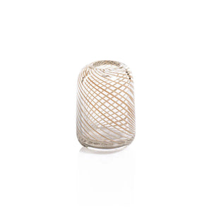 The CLAIRE BUD VASE WITH BEIGE SWIRL by ZODAX is a clear, cylindrical glass vase with a rounded top that features an intricate gold spiral design wrapping around its surface. Measuring 2.75 in x 4 in (6.99 cm x 10.16 cm), this vase is elegantly displayed against a white background.