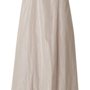 The KATHARINA HOVMAN Sleeveless Dress in Heavy Taffeta features a purist style with pleated texture, creating an elegant appearance. Its slightly shiny taffeta fabric adds sophistication to the outfit.