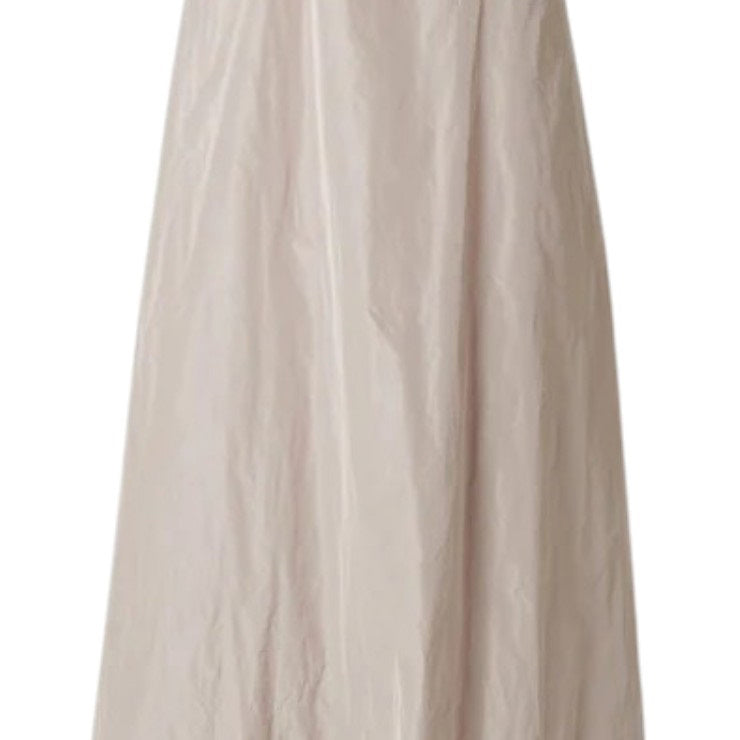 The KATHARINA HOVMAN Oversized Taffeta Dress features a long, flowing beige design with subtle sheen and elegant drape, complete with soft folds and side seam pockets. Its lightweight fabric provides airy movement, embodying a simple and timeless elegance.