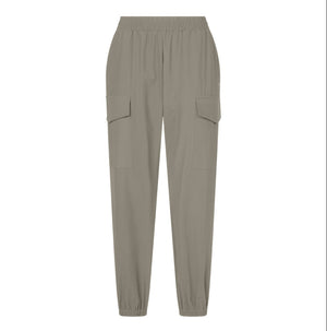 SAVE THE DUCK's GLYN Cargo Pull-On Pant features a plain, light beige textured surface with subtle vertical lines and quick-dry properties.