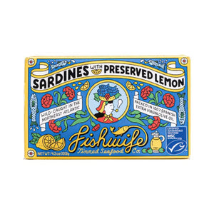 A vibrant, rectangular tin of FISHWIFE - SARDINES & PRESERVED LEMON from the Fishwife brand. The label showcases lively illustrations of sardines, a lemon, and decorative elements. It highlights that the sustainably wild-caught sardines are sourced from the Northeast Atlantic and packed in Spanish extra virgin olive oil. Net weight: 4.2 oz.