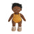 A DINKUM DOLL from OLLI ELLA USA features soft brown hair and comes dressed in a white knit romper paired with brown shoes. This charming doll has an embroidered face with brown eyes, a small nose, and a gentle smile. Its posable body makes it perfect for imaginative playtime, and it is posed standing upright.